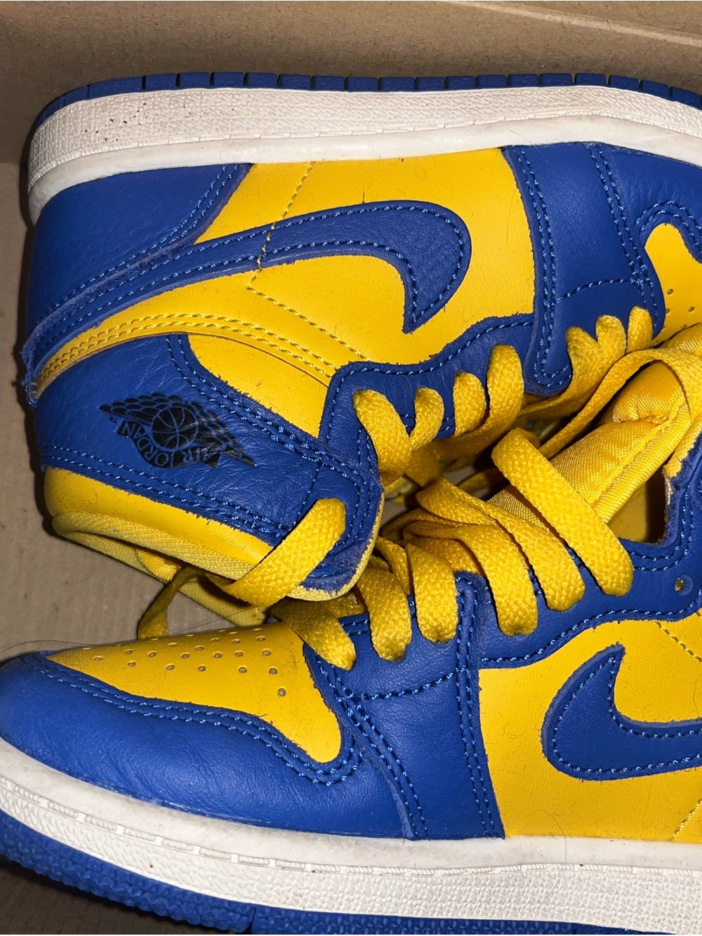 Jordan high-top sneakers in blue and yellow
